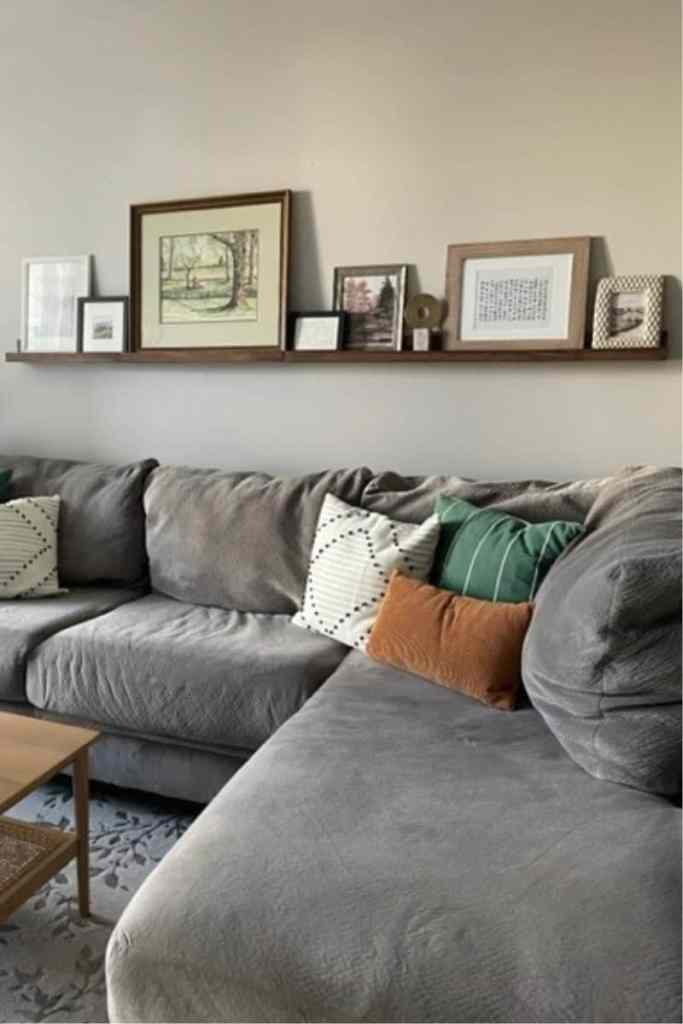 long picture ledge behind couch
