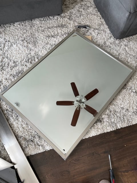 removing a mirror frame