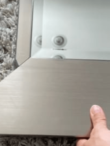 how to remove a mirror frame