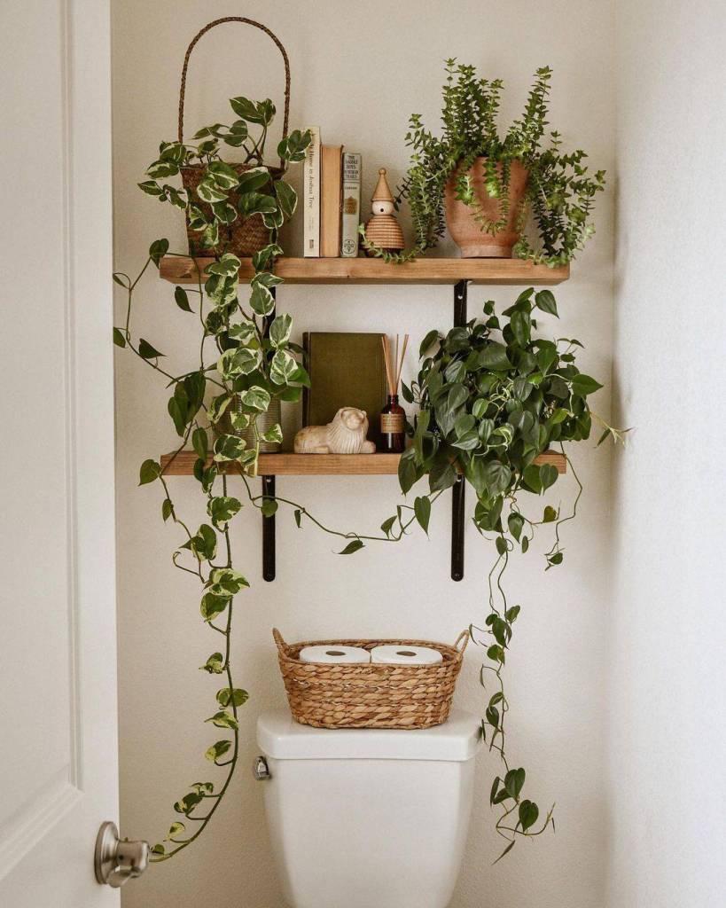 floating bathroom shelves with greenery