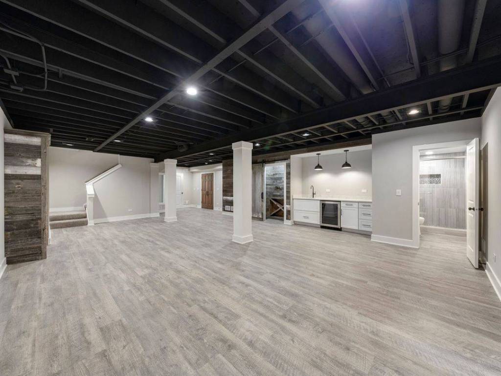 black exposed basement ceiling